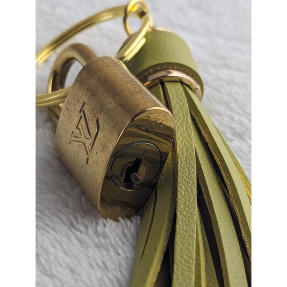 Authentic Louis Vuitton LV Lock (No Key) On Keychain With Tassle - Picture 1 of 5